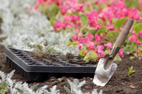 Gardening team applying safe and responsible site management practices